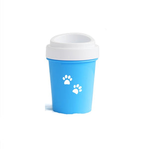 Pink reusable cup with white paw prints on a white background