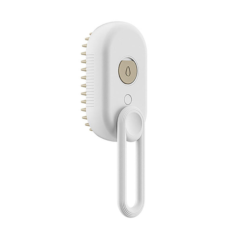 A white electric hairbrush with a hanging loop handle, featuring a circular gold-toned power button with a water droplet icon on the front.